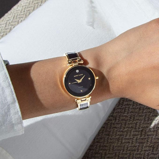 Anne Klein Women's Genuine Diamond Dial Bangle Watch (AK/1980BKGB)