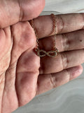 Guess Gold-Tone Rhinestone Infinity Charm Necklace