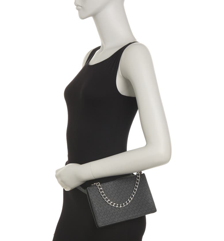 Michael kors belt bag with pull chain on sale black